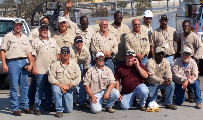Kenny Labat, far left, was part of the crew that restored power to metro New Orleans following Katrina. His twin brother Keith still works for Entergy New Orleans and was instrumental in restoring power to the Central Business District and French Quarter.